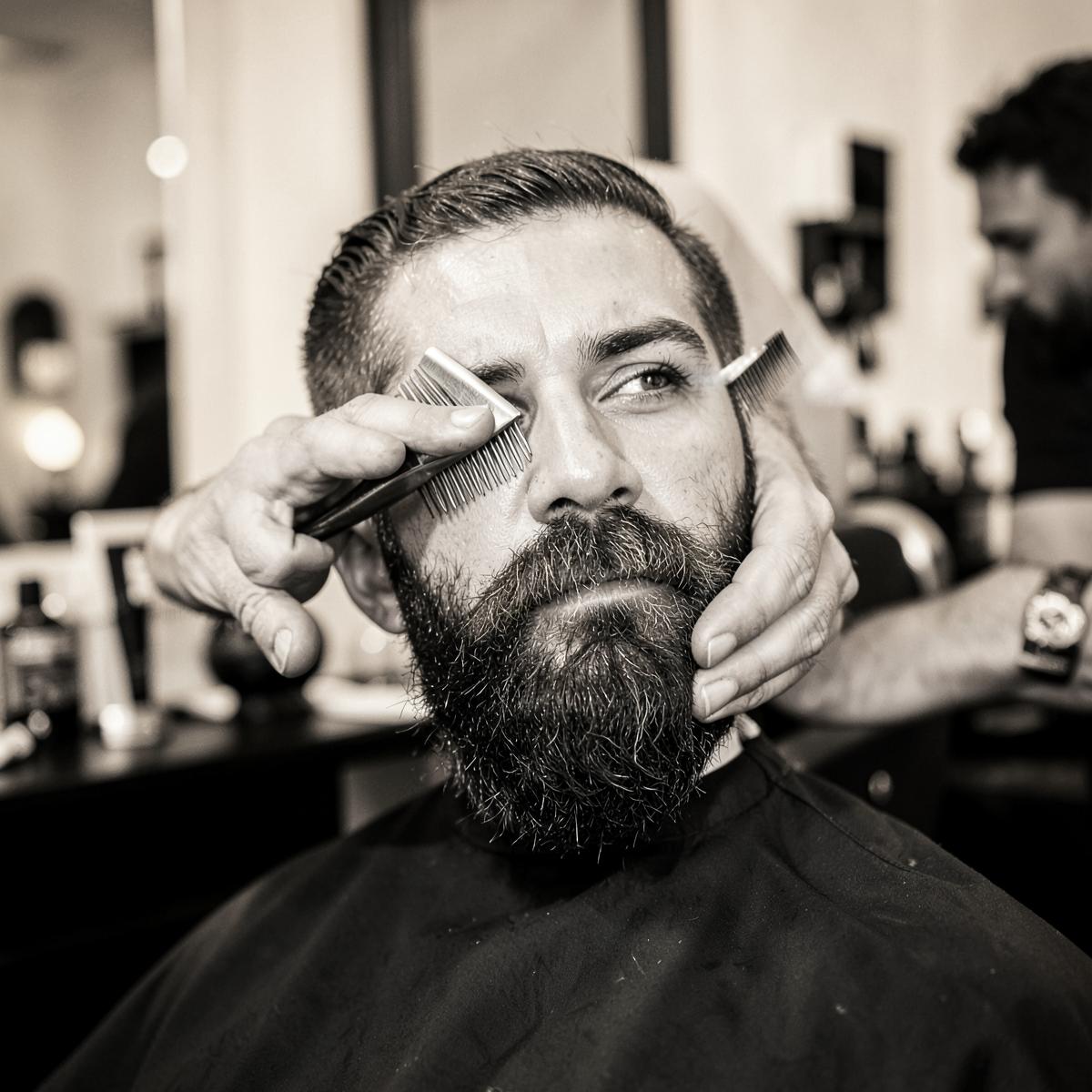 Men's haircut and beard shaped at Refined Male Grooming barbers in Leigh